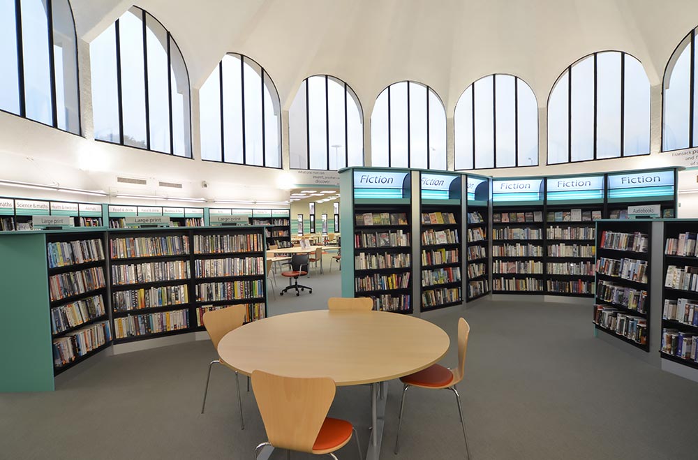 Tempting glimpses through the space pull customers forward to explore, Fullwell Cross Library