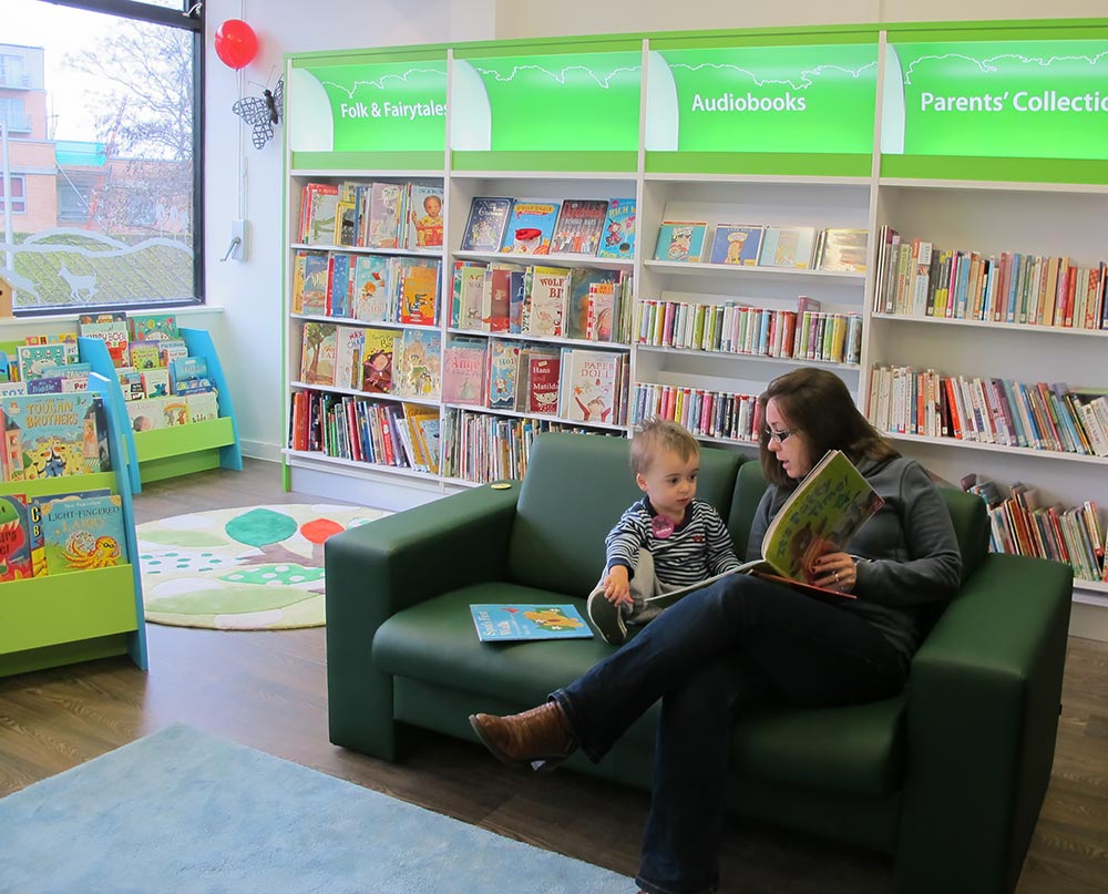 Sharing a book, South Woodford Library
