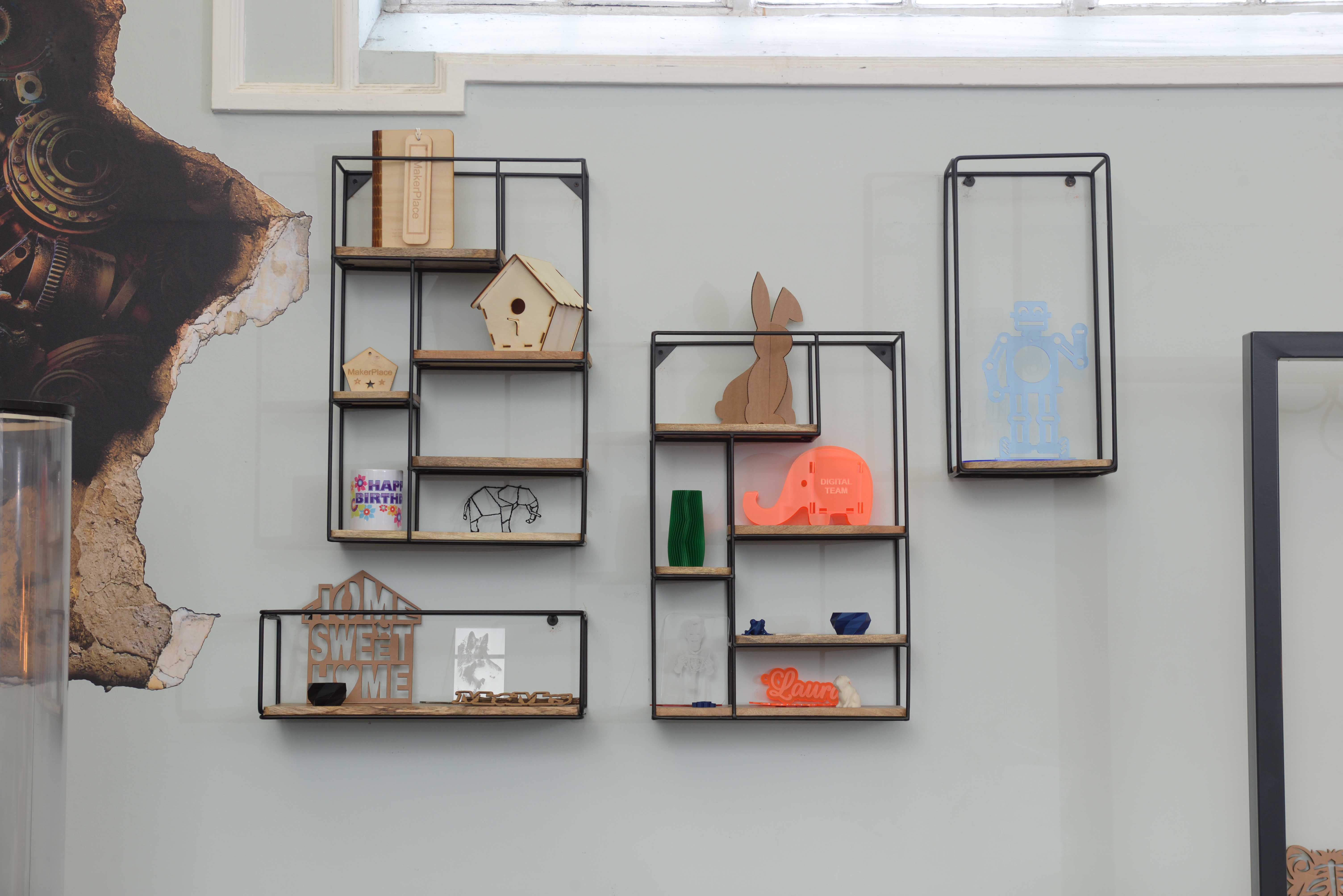 Display shelves with items produced in MakerPlace